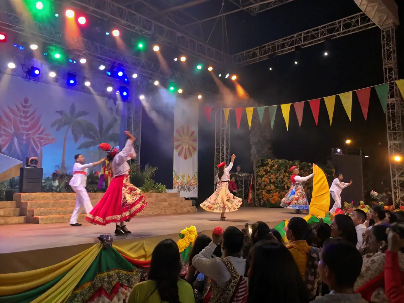 A dynamic image of performers on stage during a M.A.R. EN SCENE event, capturing the energy and excitement of a live cultural performance.